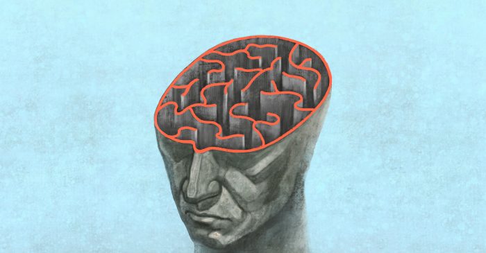 Human head, with brain outline representing a maze.